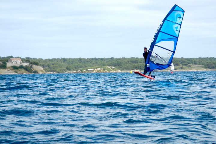 guy windsurfing