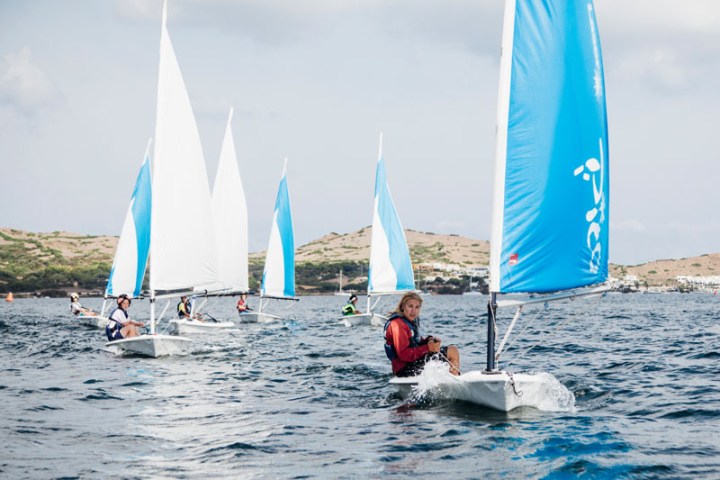 a group of people on a boat in the water