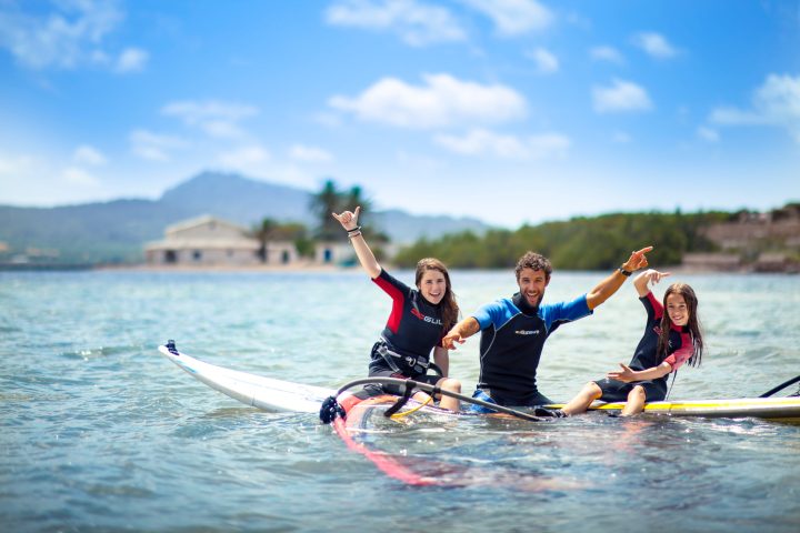 people waving to the camera