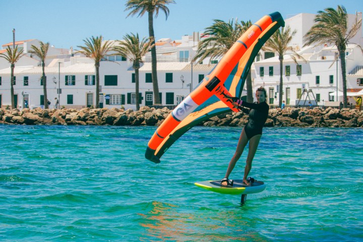 a person riding a surf board in the water